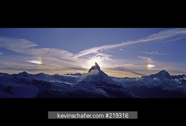 SWITZERLAND: Sun Dogs (sun halo), also known as Parhelia or Mock Suns, sun reflected in ice crystals, Matterhorn, Switzerland.