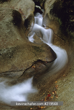 NEW HAMPSHIRE, USA: Franconia State Park, White Mountains, Pemigewasset River, small eroded channel.