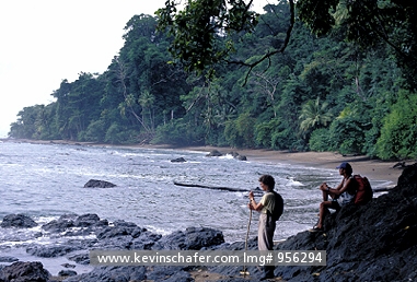 COSTA RICA: Costa Rica, Corcovado National Park, Hikers on beach.