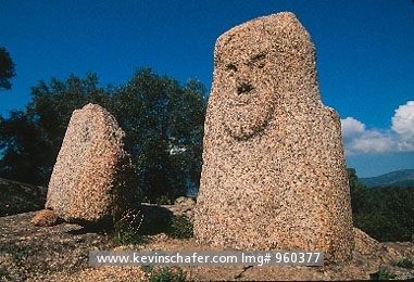 FRANCE, CORSICA: Filitosa Stone Menhir, 1800 B.C., detailed remains standing on hillside.
