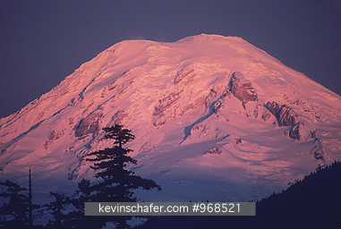 USA, WASHINGTON: View of Mt. Rainier, (inactive volcano), and sunrise from White Pass, Washington.