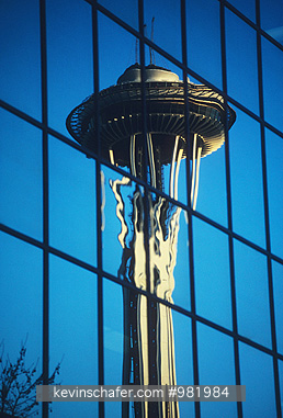 WASHINGTON STATE: USA, Washington State, Seattle, Reflection of the Space Needle in downtown office building.