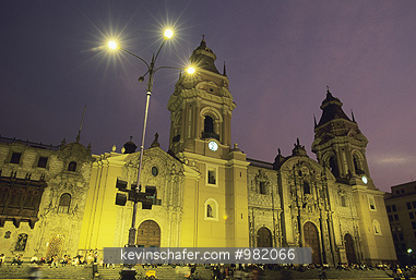 PERU: Lima, Cathedral, Plaza de Armas, weekend dusk.